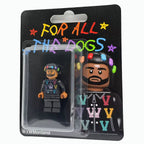 Drake "For All The Dogs" custom minifigure in blister pack; features hoodie and colorful hair clips.