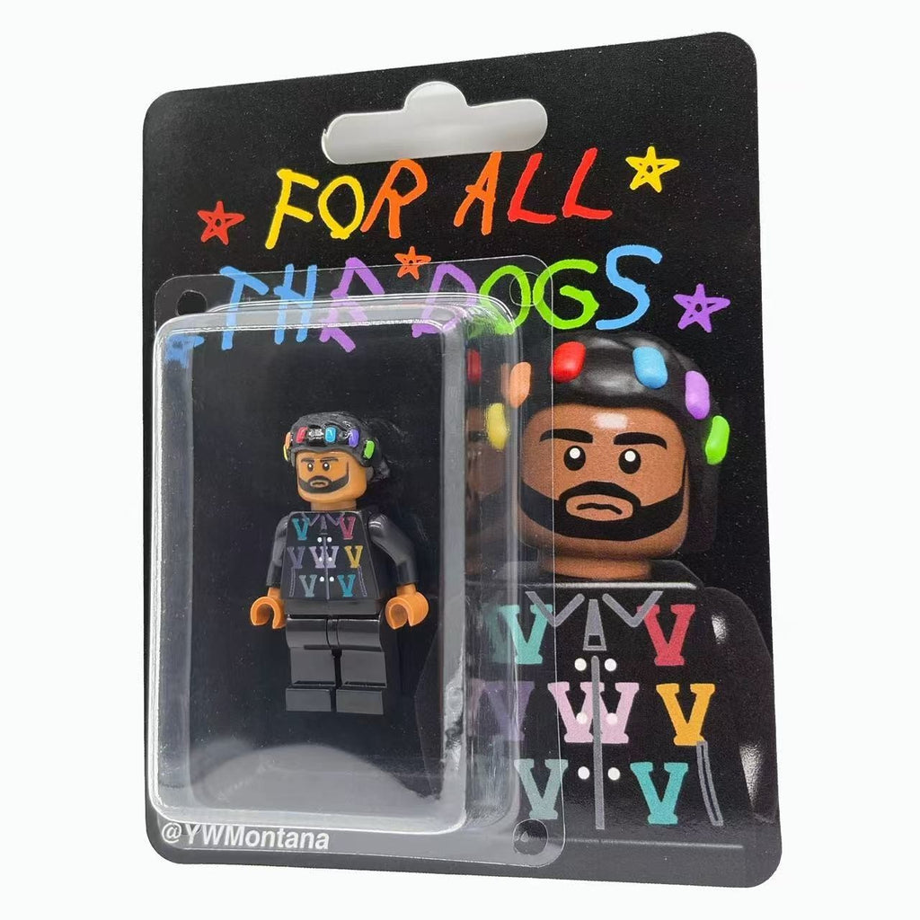 Drake "For All The Dogs" custom minifigure in black "V" logo hoodie with colorful hair clips, blister packaging.