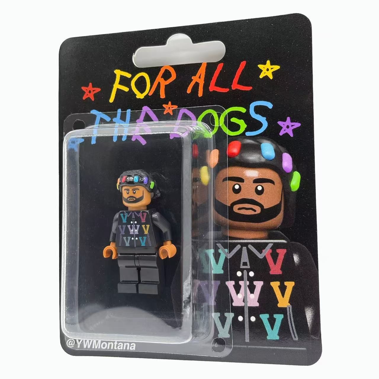 Drake "For All The Dogs" custom minifigure in black "V" logo hoodie with colorful hair clips, blister packaging.