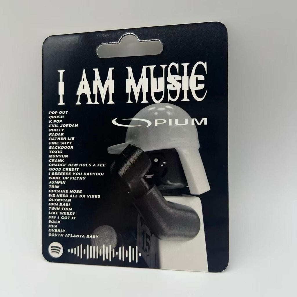 Lil Wayne "I AM MUSIC" custom minifigure packaging, black background, white text, figure visible.