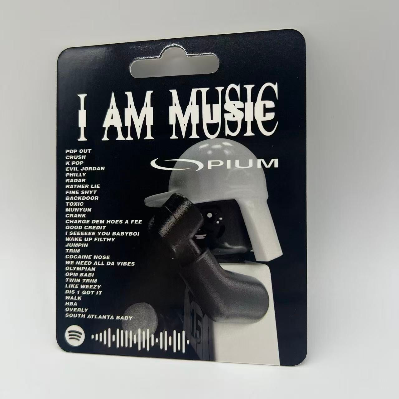 Lil Wayne "I AM MUSIC" custom minifigure packaging, black background, white text, figure visible.